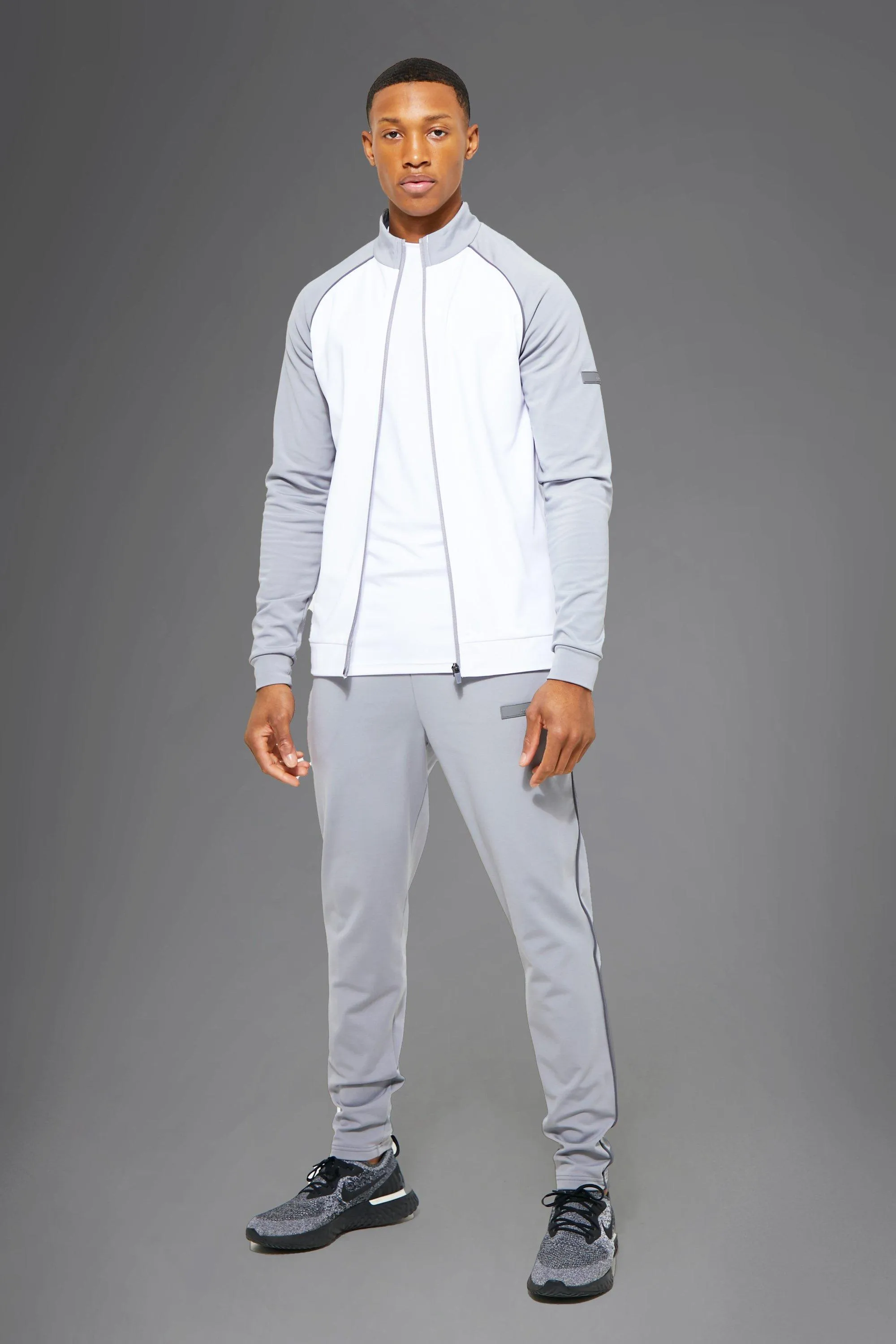 Man Active Block Piping Funnel Neck Tracksuit